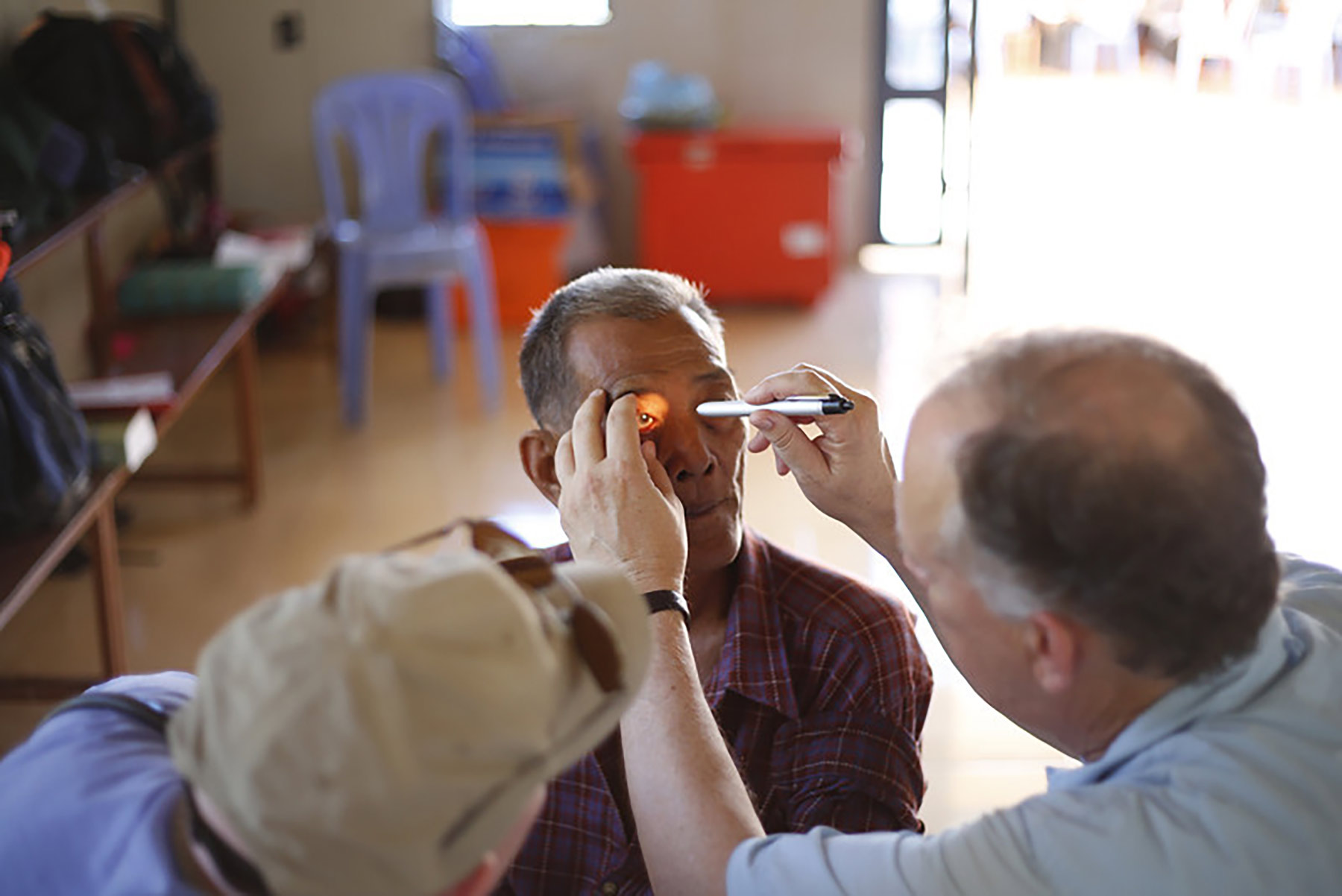A man having his eye examined