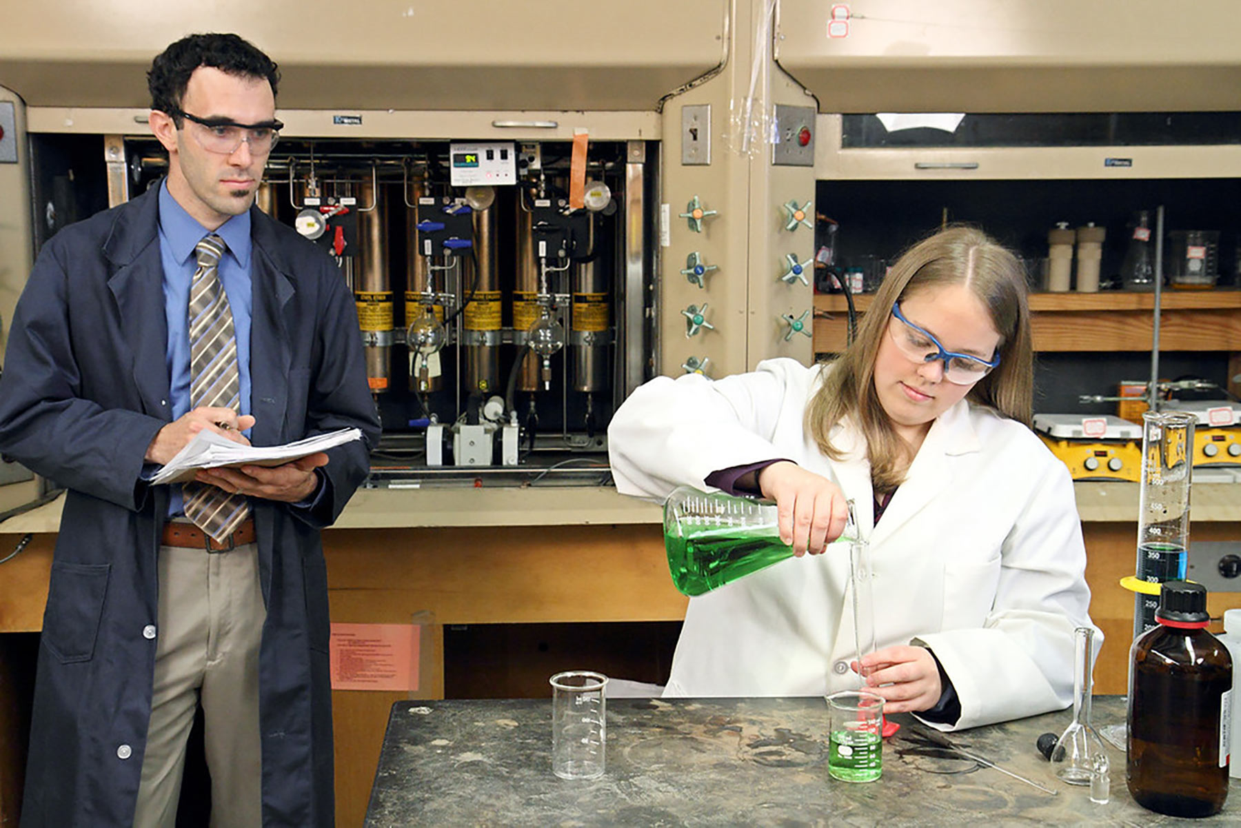 Student and teacher in a lab