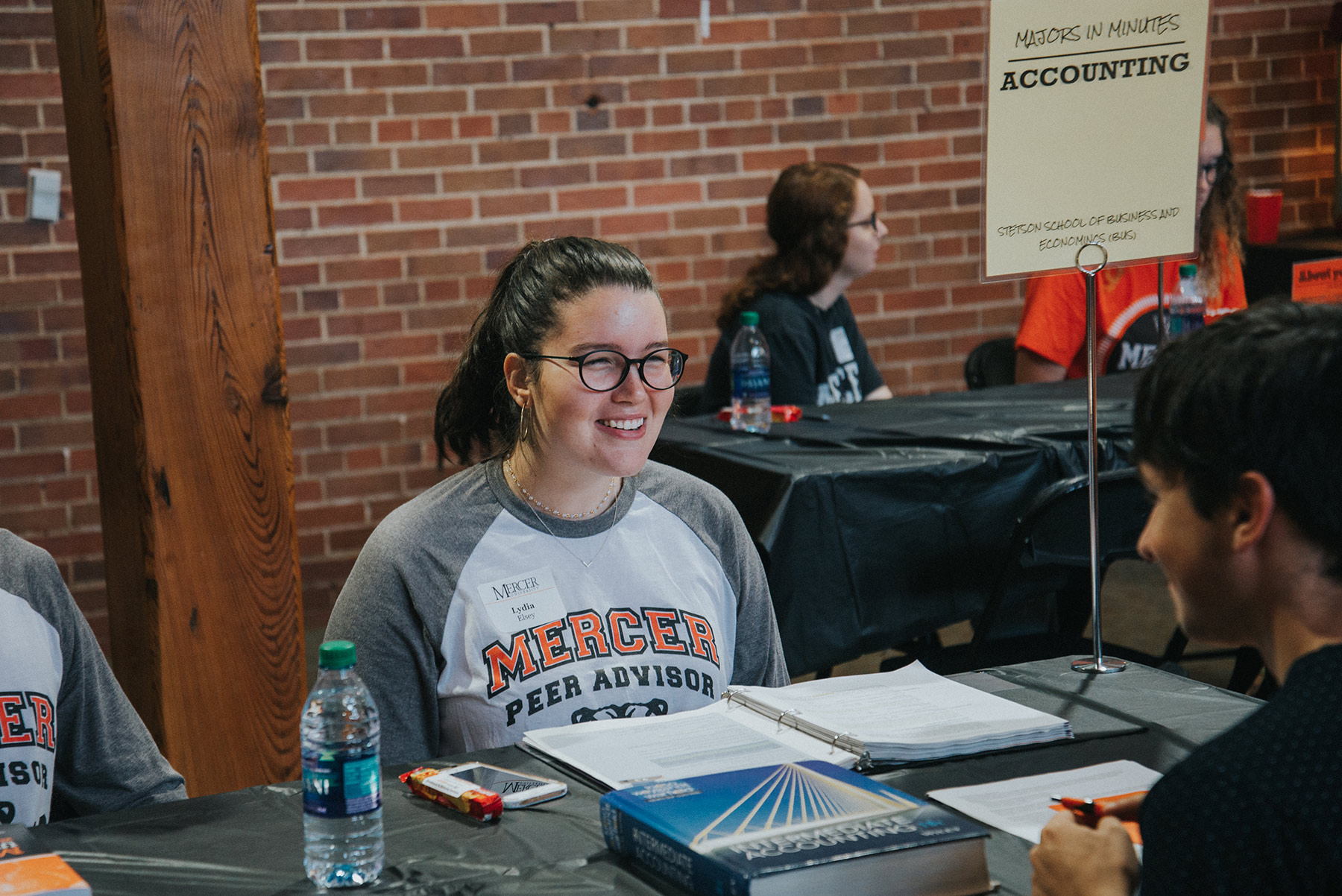 Mercer Peer Advisor sitting at a table