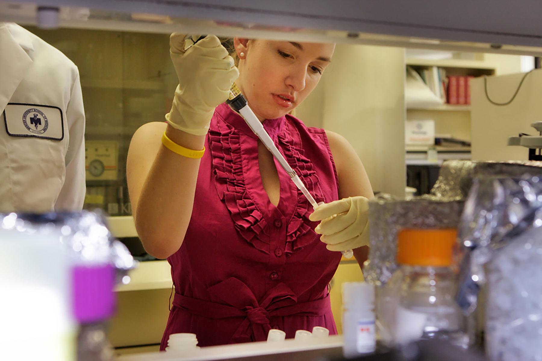 Female student working in a lab