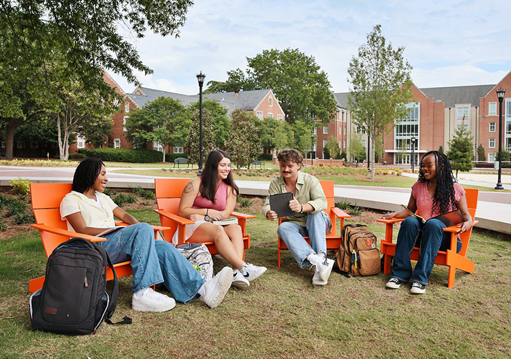 A group of students studying on campus